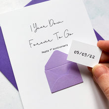 Load image into Gallery viewer, A Wedding Anniversary Date on a token, being hidden inside a mini handmade envelope on the front of a 1st Anniversary Greeting Card. The card reads 1 Year Down Forever To Go, Happy 1st Anniversary.