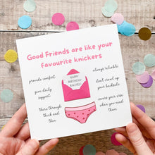 Load image into Gallery viewer, The image is a birthday card with illustrations and text, held in someone's hands.