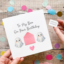 Load image into Gallery viewer, A birthday card with a ghost illustration and a small note, held by someone's hands.