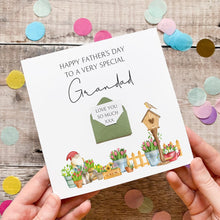Load image into Gallery viewer, A handmade Father's Day card with a garden scene and a gnome, along with confetti and a green envelope.