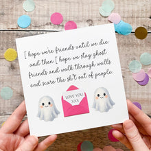 Load image into Gallery viewer, a person holding a card with a ghost illustration and a message written on it. The card has a pink envelope with a message inside, and the person is holding the card with their hands.